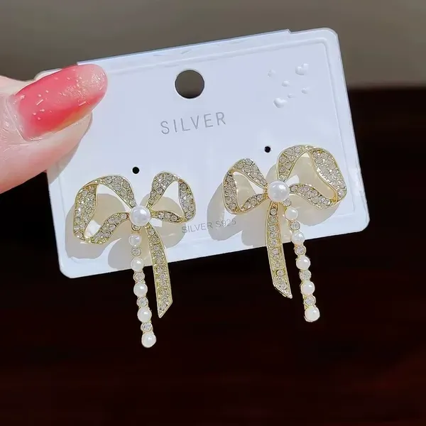 Golden_Crystal_Rhinestone_Bow_Pearl_Accent_Earrings_For_Women