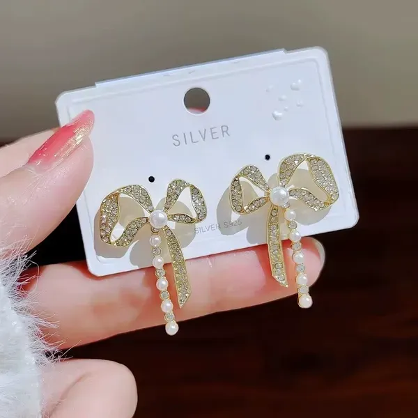 Golden_Crystal_Rhinestone_Bow_Pearl_Accent_Earrings_For_Women