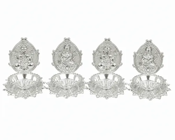 Ganesh_&_Lakshmi_Lotus_Diya_shaped_Set_of_4_-_Pure_German_Silver