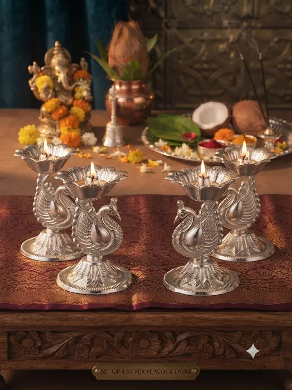 Peacock_Diya_(Pack_of_4)_-_Pure_German_Silver