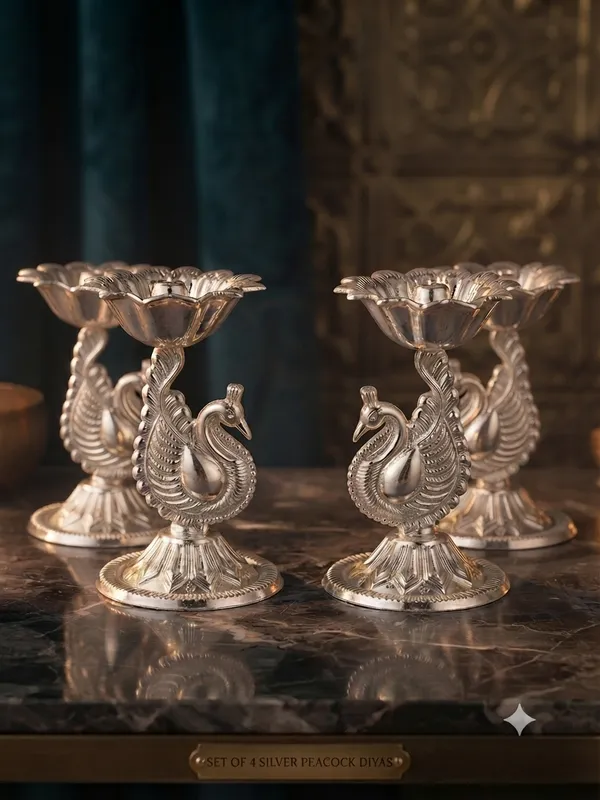 Peacock_Diya_(Pack_of_4)_-_Pure_German_Silver