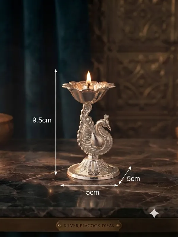 Peacock_Diya_(Pack_of_4)_-_Pure_German_Silver