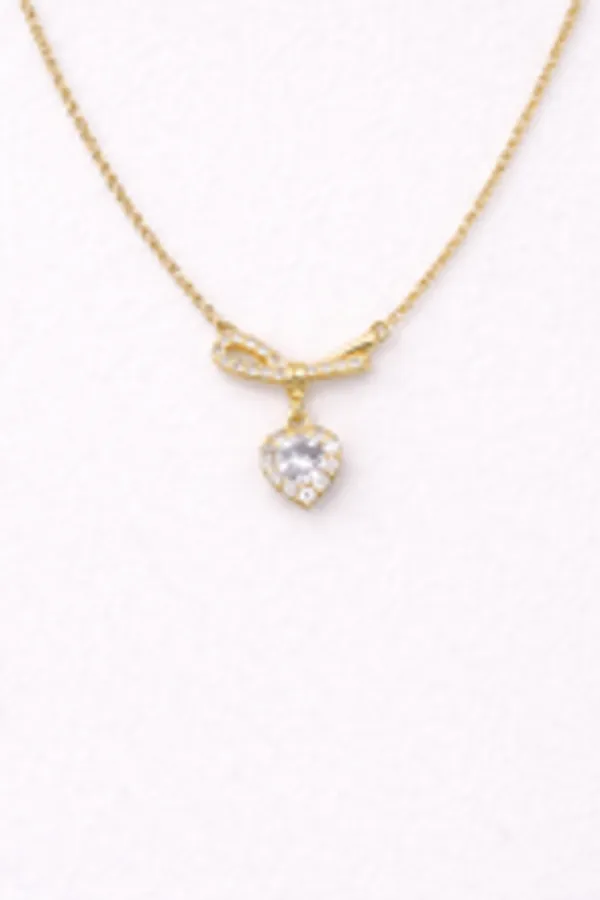 Gold_Ribbon_Bow_Necklace_With_Dainty_Heart_Drop