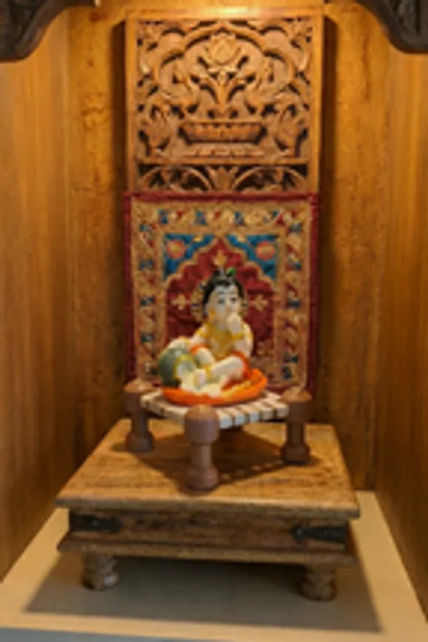 Little_Krishna_Eating_Butter_On_Charpai_Handcrafted_Polyresin_Janmashtami_Decor