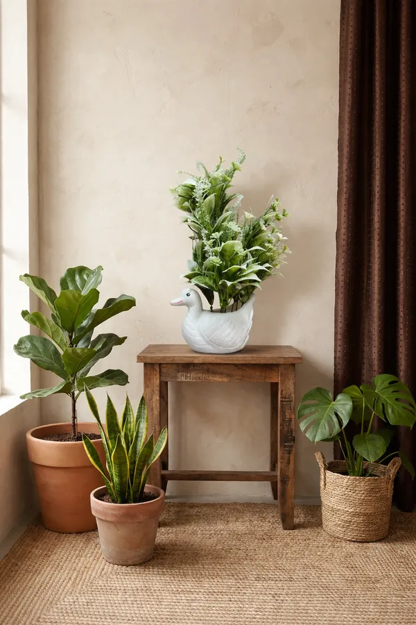Whimsical_Ceramic_Duck_Planter_With_Faux_Greenery