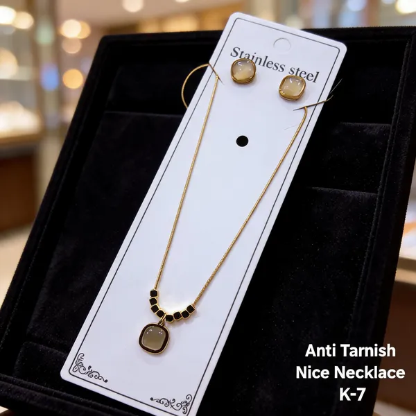 Golden_Brass_And_Alloy_Necklace_&_Earrings_Set_For_Women
