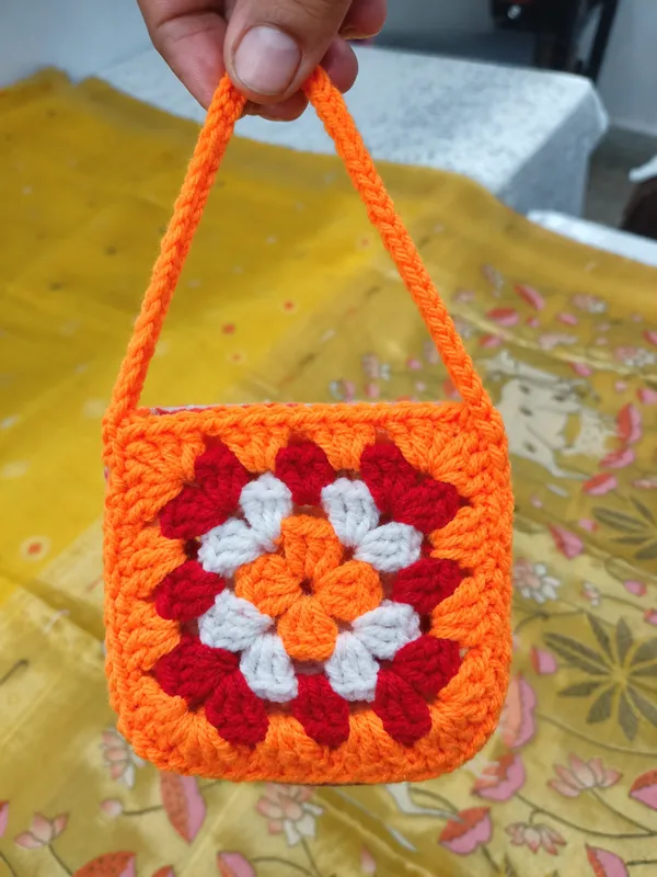 Gau-Dharini_(Honoring_the_sacred_Kamdhenu_motifs)with_handmade_crochet_pauch