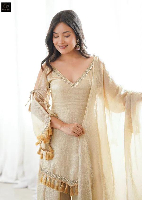 Luminous_Beige-Gold_Textured_Silk_Blend_Cold-Shoulder_Kurta_with_Sharara_&_Tasselled_Dupatta_Set