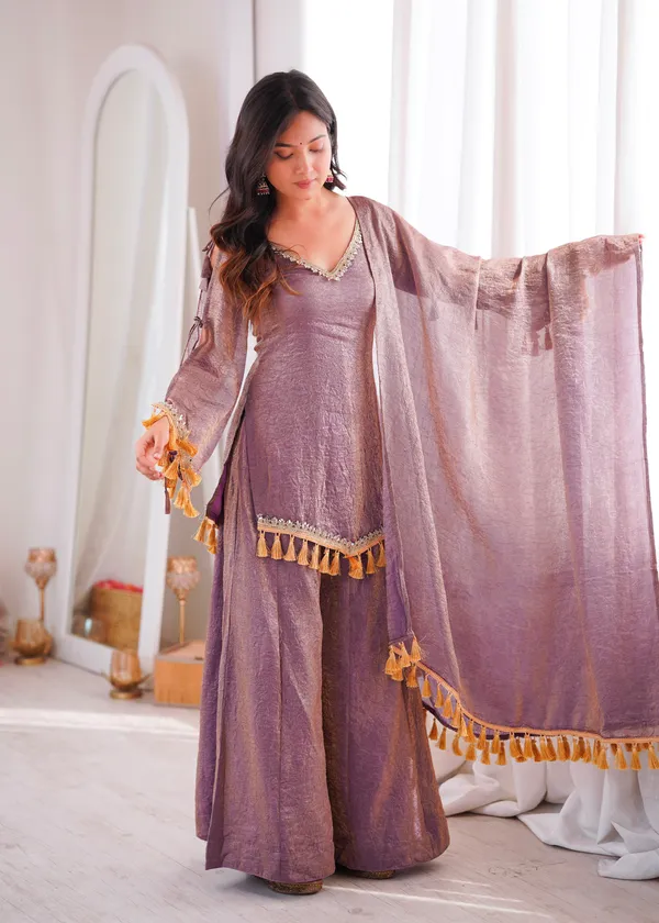 Opulent_Mauve-Lavender_Textured_Silk_Blend_Cold-Shoulder_Kurta_with_Sharara_&_Tasselled_Dupatta_Set
