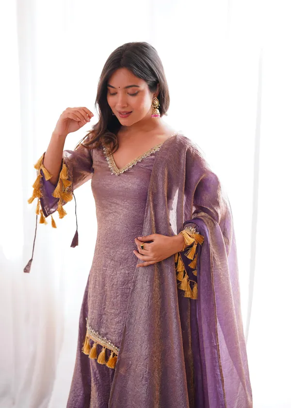 Opulent_Mauve-Lavender_Textured_Silk_Blend_Cold-Shoulder_Kurta_with_Sharara_&_Tasselled_Dupatta_Set