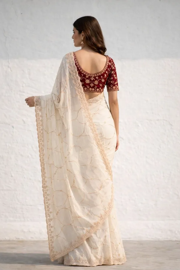FLUIT_LESVETEMENTS_Embroidered_Bollywood_Georgette_Saree_with_Unstitched_Blouse_(Cream)