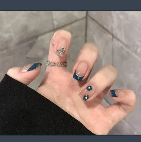 Teal_French_Tip_Press_On_Nails_Nude_With_Deep_Teal_Tips_Flower_Accents