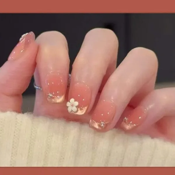 Peachy_Blossom_Press_On_Nails_Coral_Gradient_With_Floral_Accents