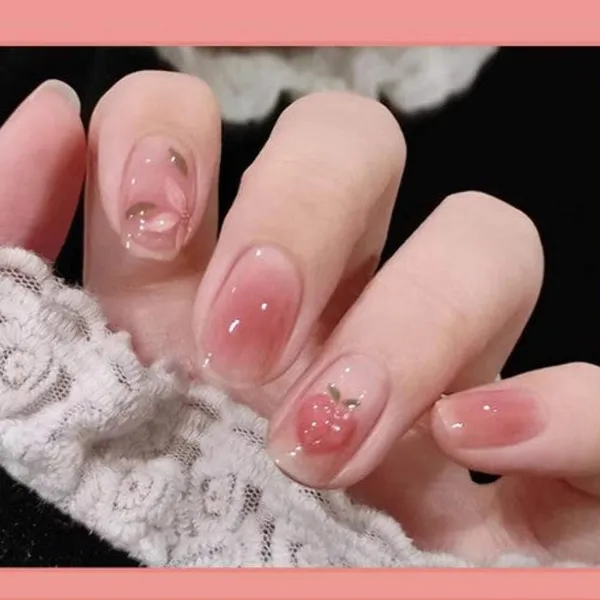 Rosy_Gradient_Charm_Press_On_Nails_Pink_Ombre_With_Heart_Bow_Accents