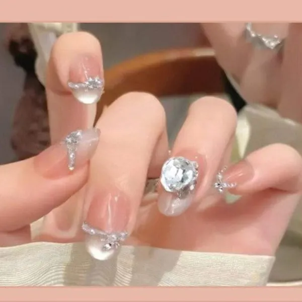 Crystal_Elegance_Press_On_Nails_Nude_With_Luxe_Rhinestone_Accents