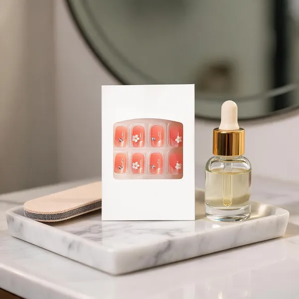 Peachy_Blossom_Press_On_Nails_Coral_Gradient_With_Floral_Accents