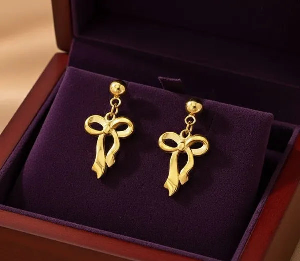 Gold_Plated_Stainless_Steel__Infinity_Bow_Drop_Earrings