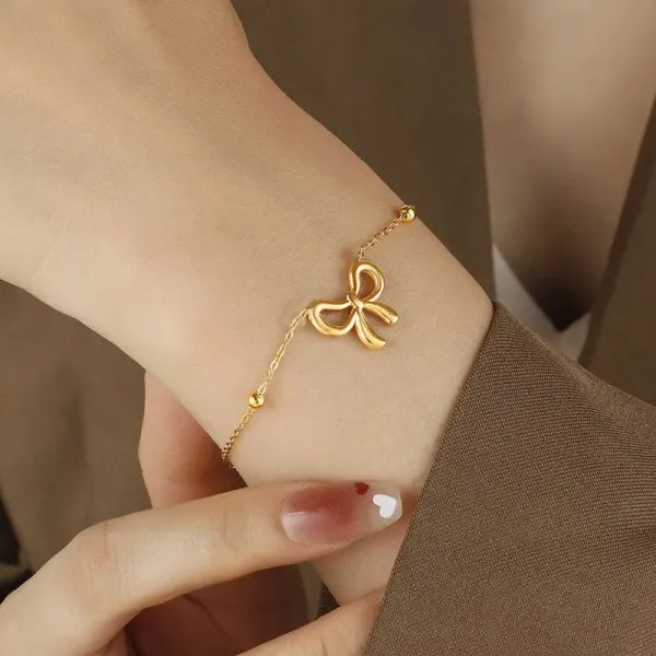 Gold_Plated_Stainless_Steel_Bow_Themed_Wraparound_Bracelet