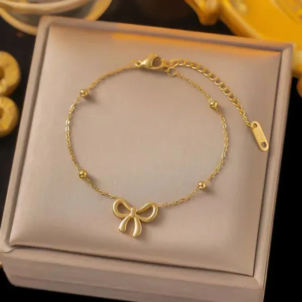 Gold_Plated_Stainless_Steel_Bow_Themed_Wraparound_Bracelet