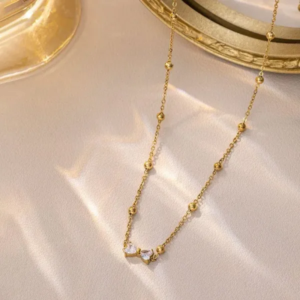 Gold_Plated_Stainless_Steel_Bow_Themed_Pendant