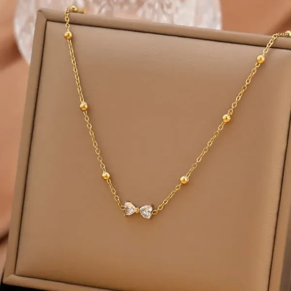 Gold_Plated_Stainless_Steel_Bow_Themed_Pendant