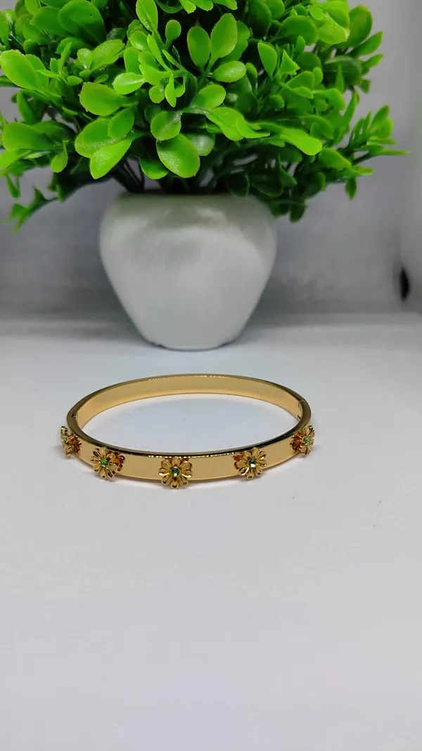 Gold_Floral_Bloom_Bangle_With_Emerald_Green_Accents