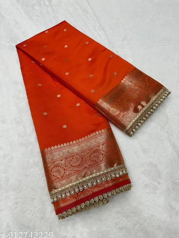 Soft_Silk_Mohmaya_Maharani_Orange_Saree_Booty_With_Moti_Lace_Attached
