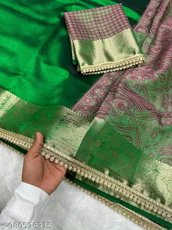 Exclusive_Pashmina_Tissue_Kaat_Baand_Banarasi_Saree_In_Green_With_Moti_Lace_Attached