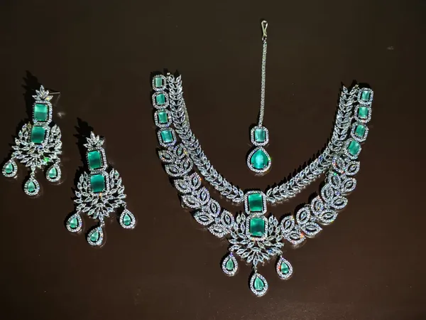 Silver_And_Green_American_Diamond_Green_Stone_Floral_Necklace_Set_With_Earrings_For_Women