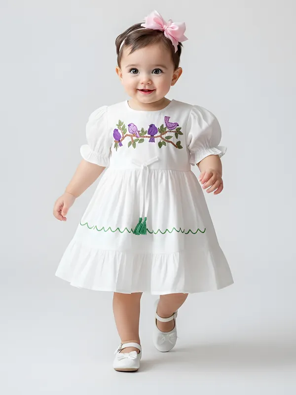 Bella_Moda_Girls_Embroidered_Bird_Motif_Cotton_Dress_With_Puff_Sleeves_And_Tassels