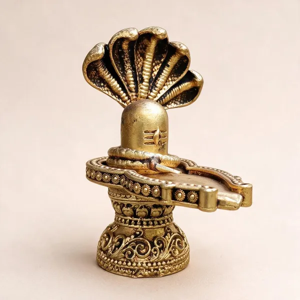 Gold_Tone_Shiva_Lingam_Idol_With_Cobra_Hood