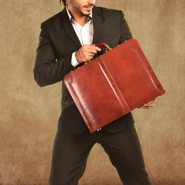 Genuine_Leather_Briefcase_Laptop_Case_Internal_Reasoning_Summary_I_Removed_Brand_Name_Lindsey_Street_Color_Brown_Size_Specification_15_Inches_Marketing_Terms_Attache_Business_Macbook_Specific_Reference_Redundant_Descriptors_Kept_Material_Genuine_Leather_Core_Product_Type_Briefcase_Primary_Function_Laptop_Case_Internal_Reasoning_Summary