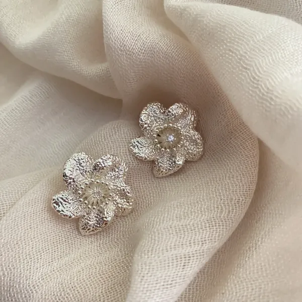 Silver_Stainless_Steel_Textured_Bloom_Stud_Earrings_For_Women