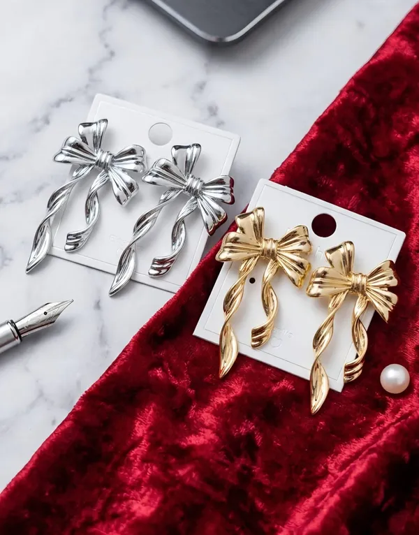 Silver_Alloy_Sculpted_Ribbon_Bow_Stud_Earrings_For_Women