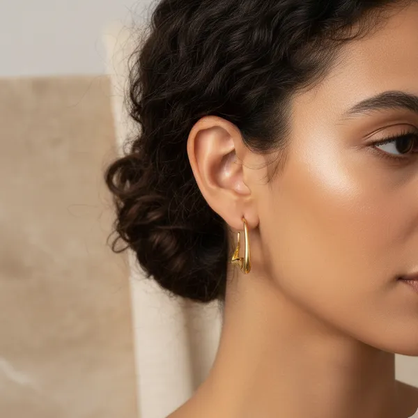 Gold_Alloy_Sculptural_Wave_Hoop_Earrings_For_Women