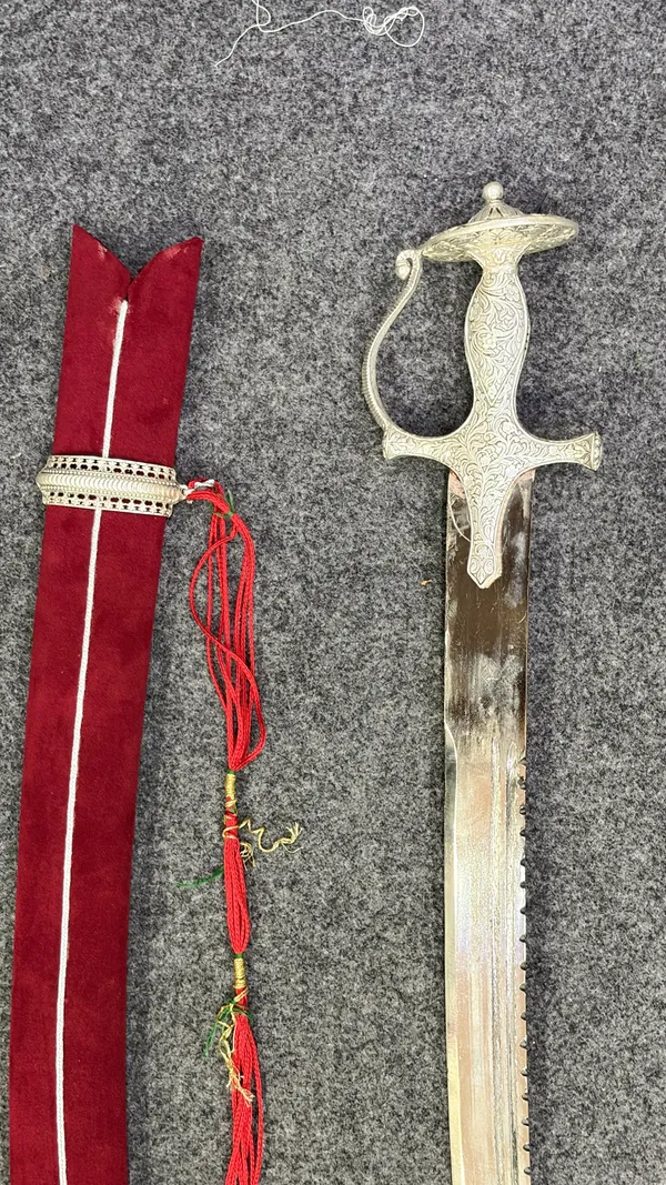 Royal_Silver-Finish_Curved_Decorative_Sword_with_Red_Velvet_Scabbard
