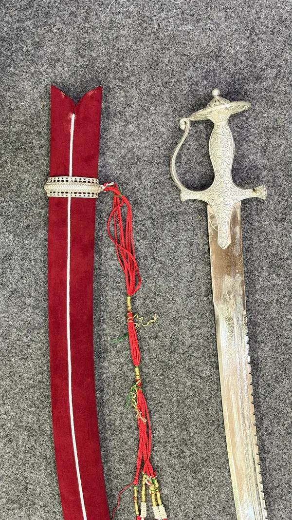 Royal_Silver-Finish_Curved_Decorative_Sword_with_Red_Velvet_Scabbard
