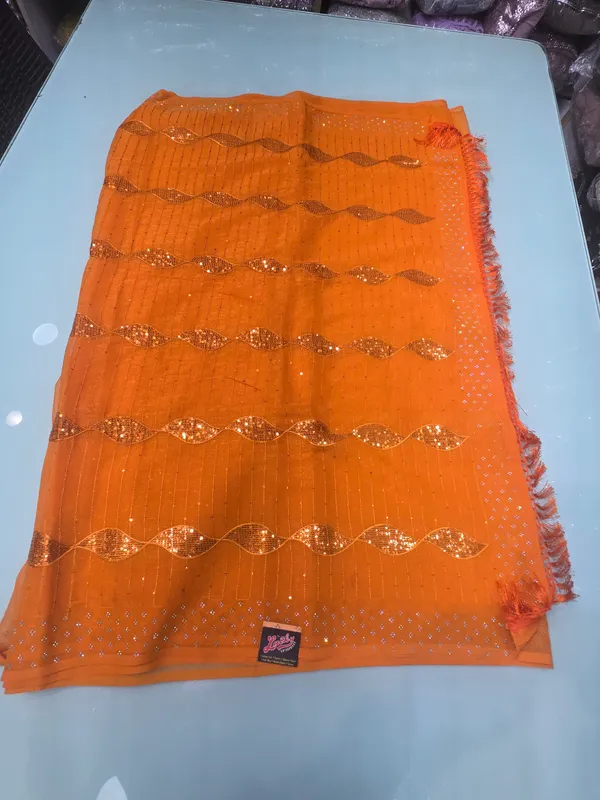 mustard_yellow_saree_with_sequiece_and_self_sworsoki_stone_work