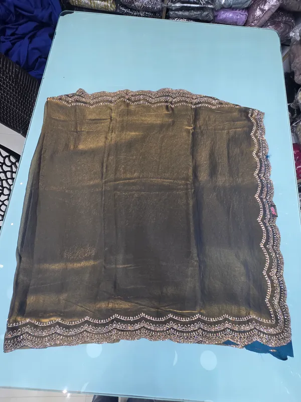 shimmer_geroegtt_with_plain_saree_with_stone_work