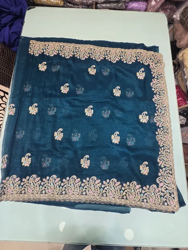 t_blue_saree_with_heavy_border_and_butta_work_on_full_saree