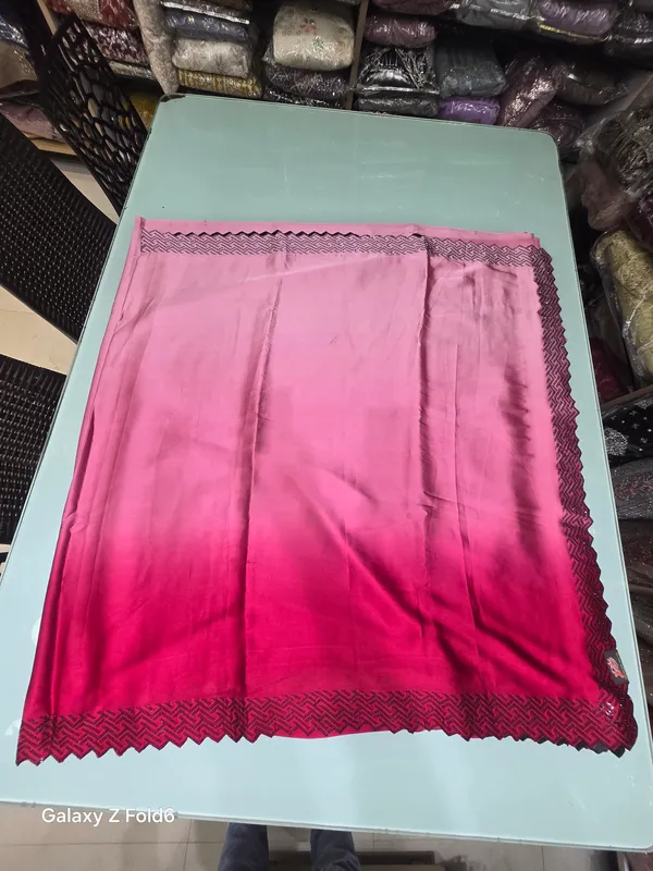shaded_satin_fabric_with_black_swaroski_stone_work_on_border_plain_saree