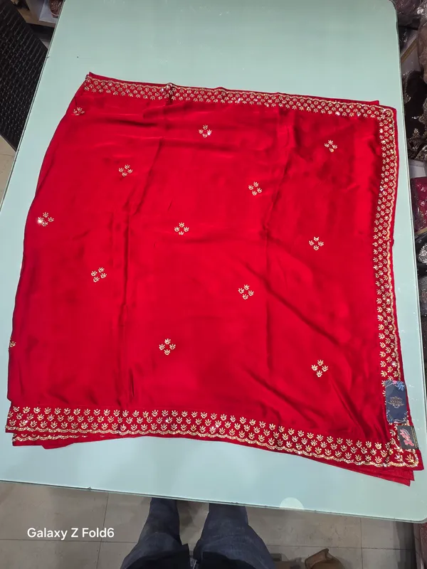 heavy_stone_work_border_and_butta_falling_material_with_blouse_work
