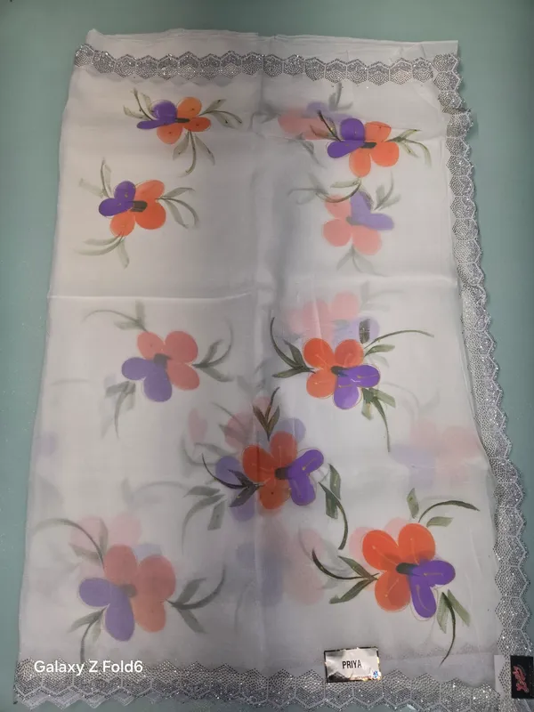 white_saree_printed_ewith_border_work