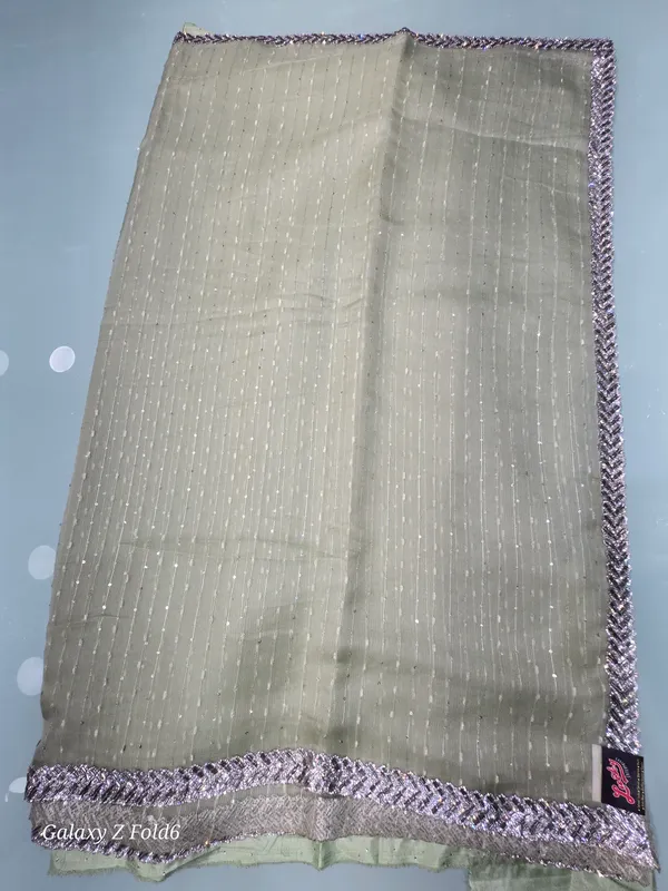 plain_saree_heavy_border_ston