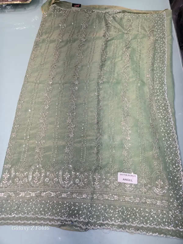 pista_green_saree_with_border_stone_work