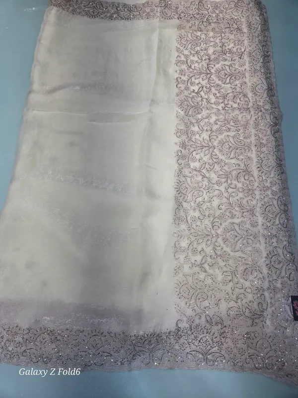 full_heavy_border_saree_with_self_embrodery_and_stone