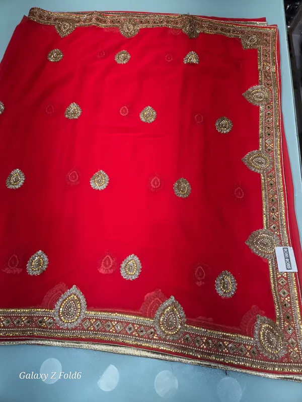 full_heavy_border_saree_with_self_embrodery_and_stone_kundan_work