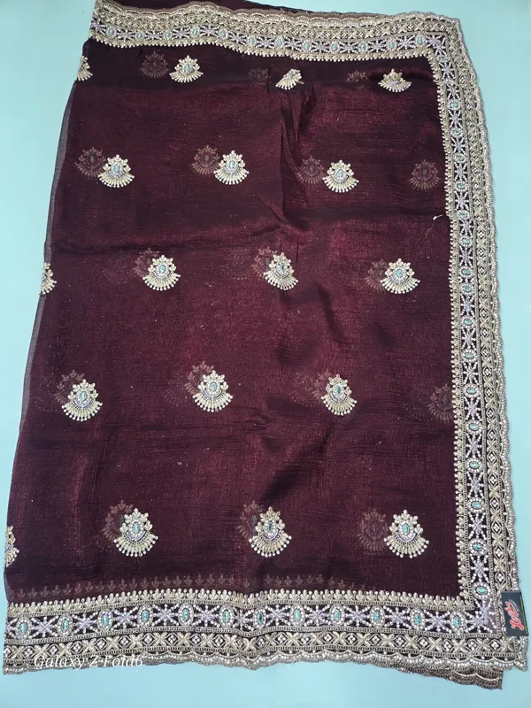 full_heavy_border_saree_with_self_embrodery_and_stone_kundan_work