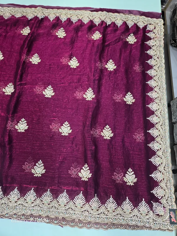 full_heavy_border_saree_with_self_embrodery_and_stone_kundan_work