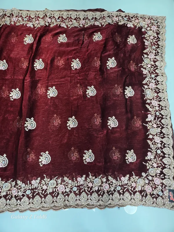 full_heavy_border_saree_with_self_embrodery_and_stone_kundan_work